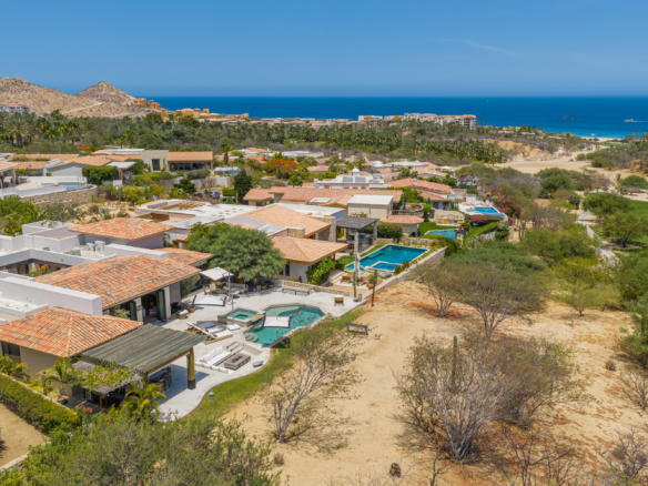 Cabo del Sol Brisas Discover Naah Payil, an exceptional estate where the warmth of a Contemporary Mexican Hacienda blends seamlessly with the relaxed sophistication of coastal living. Located within one of Los Cabos' most exclusive and secure communities, this architectural masterpiece was custom-designed by MCA, led by renowned architect Antonio Carrera. Thoughtfully enhanced in 2015 and again in 2025, the residence beautifully balances timeless character with today's highest standards of comfort and design. At the heart of the home, a central courtyard anchored by a signature tree creates a tranquil gathering space filled with natural light. The home's thoughtful design embraces effortless indoor-outdoor living. Open the grand living room doors, and refreshing ocean breezes naturally flow throughout the residence, creating a comfortable and inviting atmosphere – 12 Cabo del Sol Brisas, Cabo Corridor, BS
